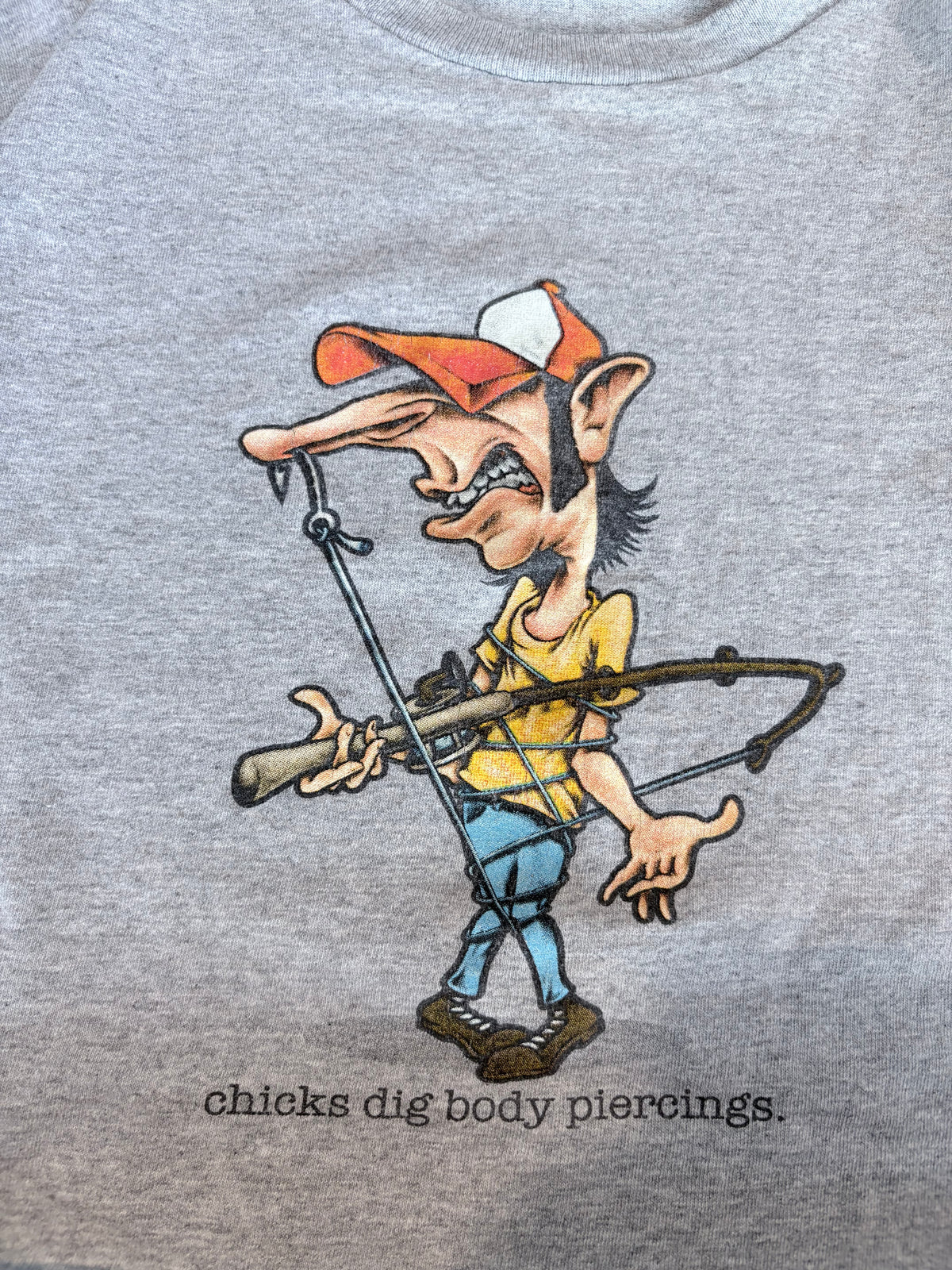 Y2K Fishing Body Piercing Graphic Tee
