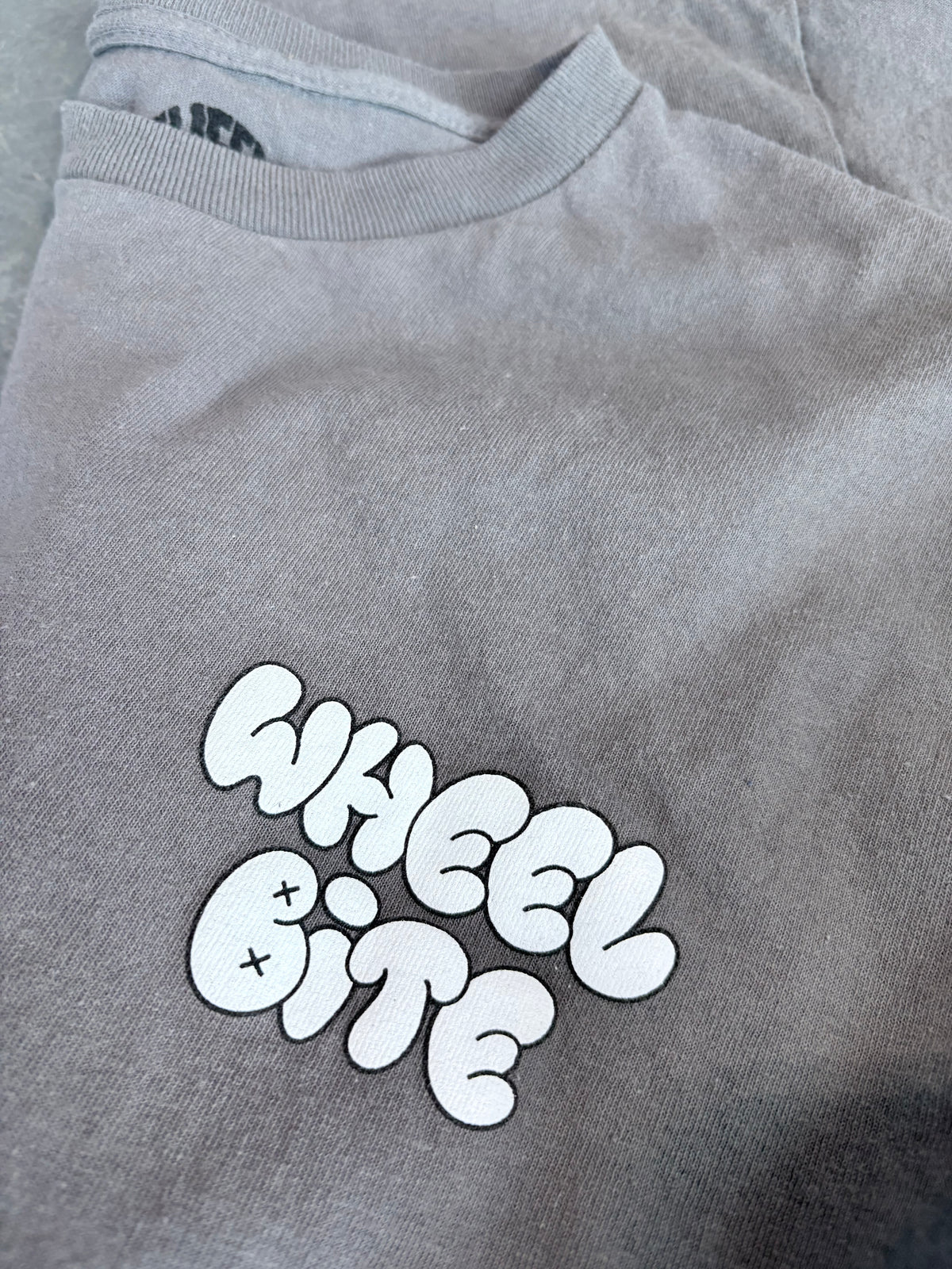 Hill Street Bomber Wheel Bite Skater Graphic Tee